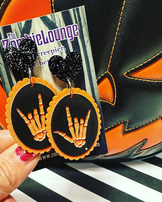 Boucles d'oreilles mains squelettes de la Saint-Valentin