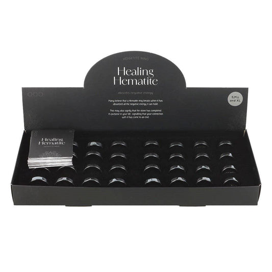 Ensemble de 32 bagues en hématite guérisseuse en présentoir