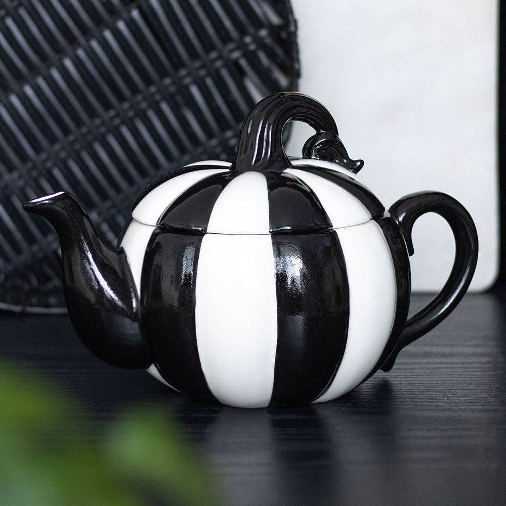 Théière citrouille d'Halloween à rayures noires et blanches