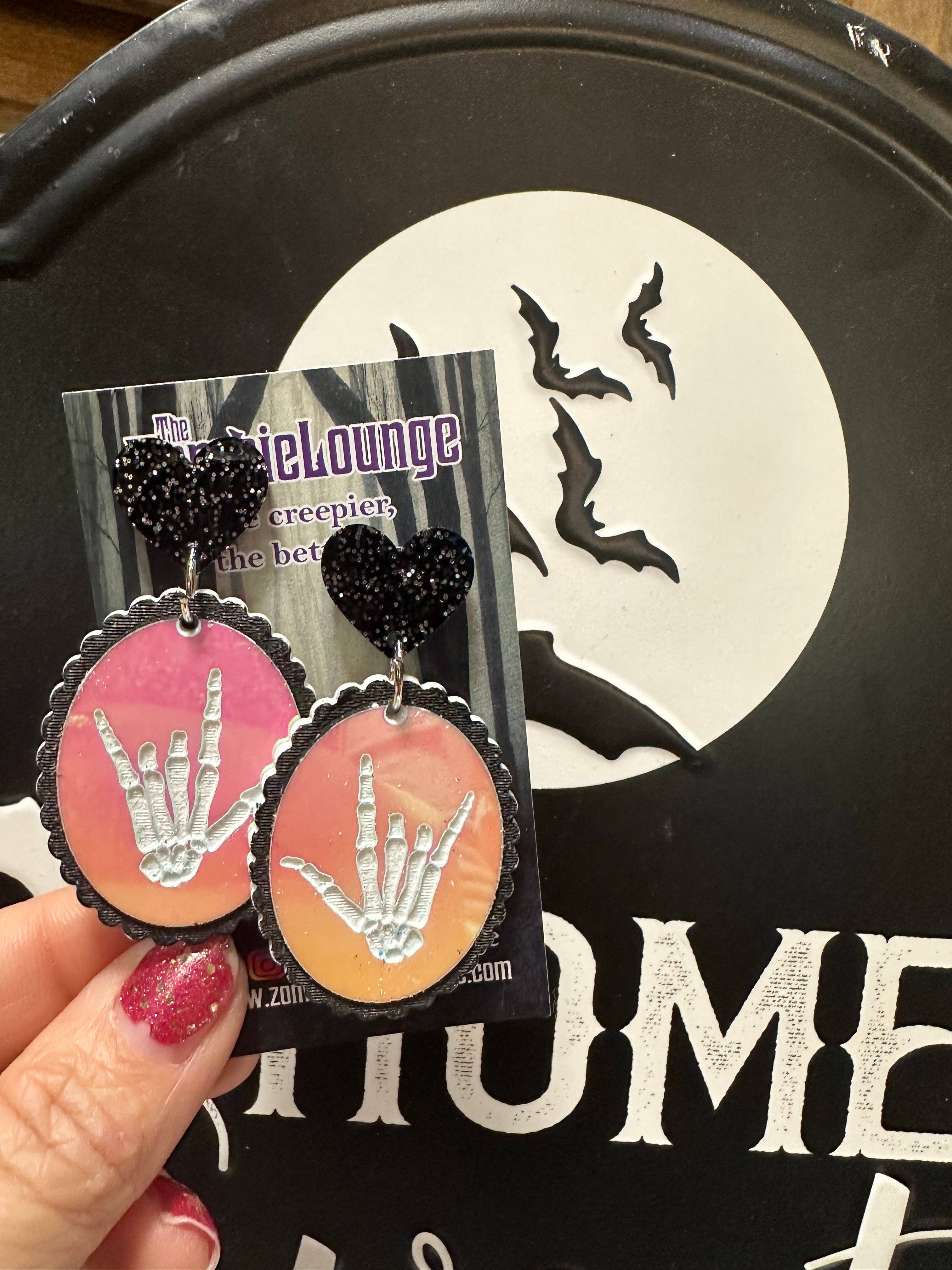 Boucles d'oreilles mains squelettes de la Saint-Valentin